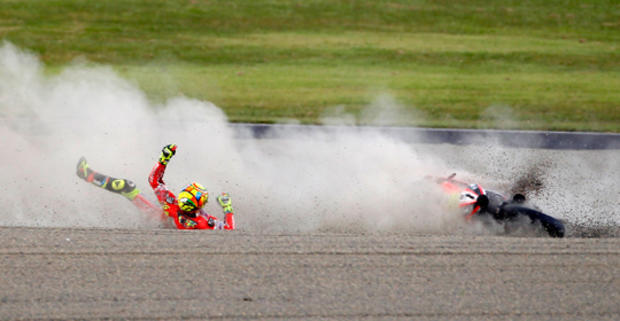 Valentino Rossi falls off his Ducati  