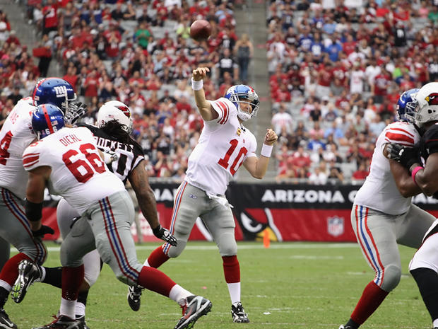Eli Manning throws a pass  