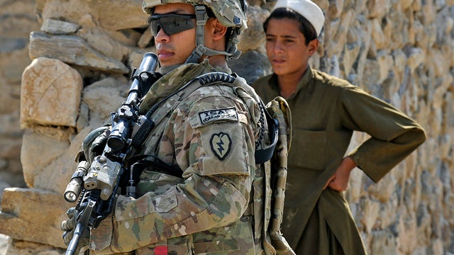 U.S. Army Sgt. Vu Nhon keeps watch Sept. 30, 2011, during a mission in the border-crossing town of Turkham Nangarhar, Afghanistan, near the border with Pakistan. 