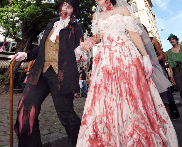 People dressed up as zombies take part i 