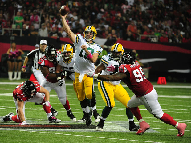 Aaron Rodgers passes against the Atlanta Falcons 