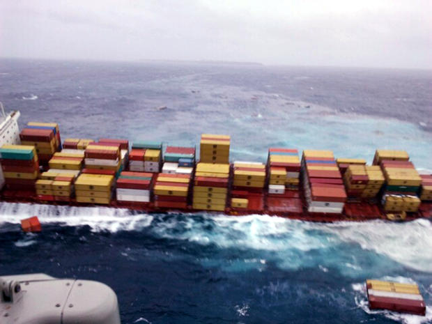 Shipping containers float Oct. 12, 2011, in the water around the cargo ship Rena that has been foundering since it ran aground Oct. 5, 2011, on the Astrolabe Reef about 14 miles from Tauranga Harbour, New Zealand, in this photo released by Maritime New Ze 