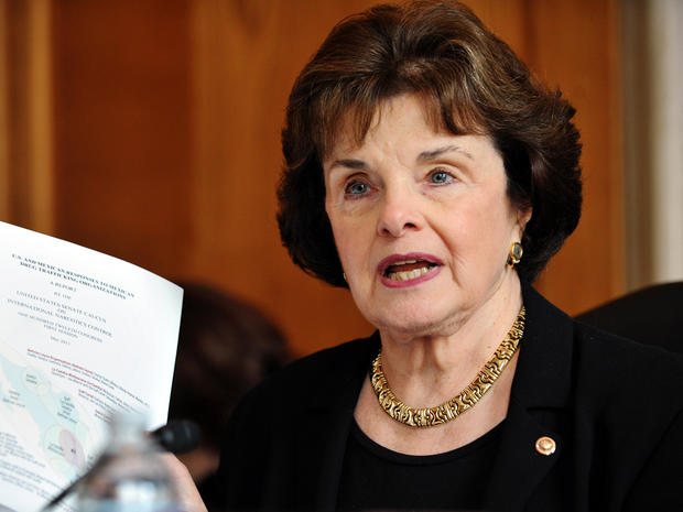 Sen. Dianne Feinstein, D-Calif., holds up a copy of a report at a Senate hearing May 25, 2011, in the Dirksen Senate Office building on Capitol Hill in Washington. 