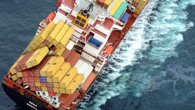 The Liberian cargo ship Rena lists helplessly off the coast of Tauranga, New Zealand, Oct. 13, 2011, where it has been stricken since Oct. 5, 2011. The ship's Filipino captain has been charged and is facing a fine or 12 months in jail. New Zealand officia 