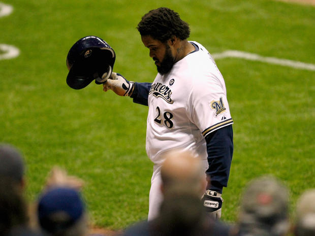 Prince Fielder walks back to the dugout 