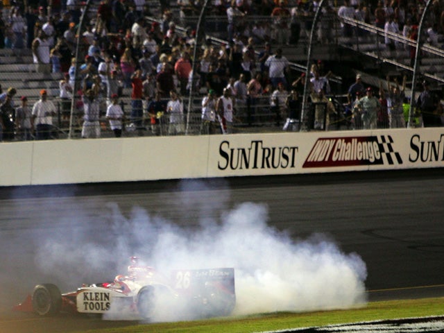 Dan Wheldon makes donuts after winning SunTrust Indy Challenge 