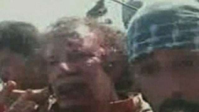 GRAPHIC VIDEO: Qaddafi wounded but alive 