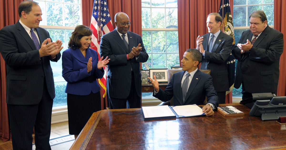 Obama signs 3 free trade deals - CBS News