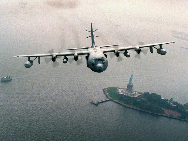 A U.S. Air Force Commando Solo aircraft flies over the Statue of Liberty Oct. 23, 2001, in New York Harbor. The Commando Solo is an EC-130 aircraft used for psychological operations and flown by the 193rd Special Operations Wing, Pennsylvania Air National 