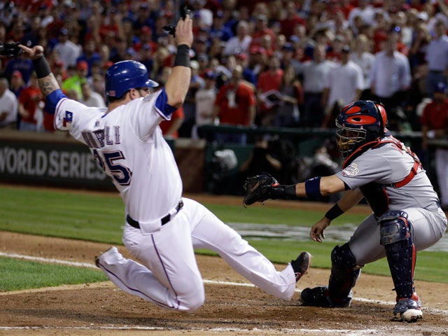 Yadier Molina tags out Mike Napoli 
