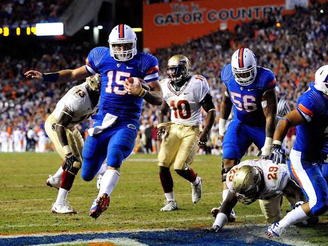 Tim Tebow runs for a touchdown  