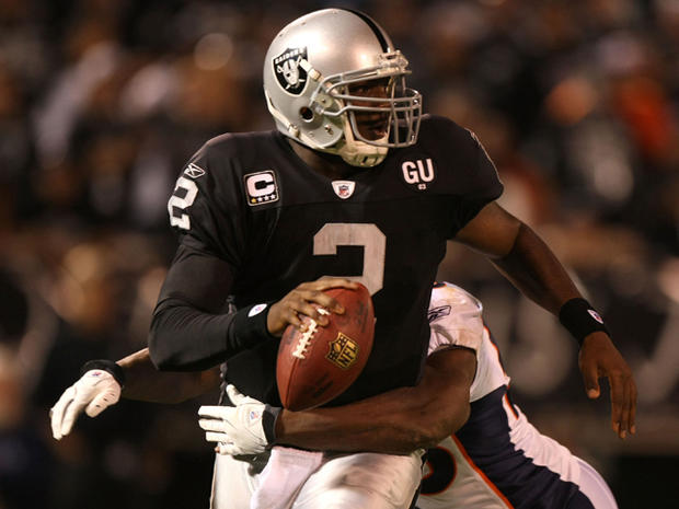 JaMarcus Russell is sacked by D.J. Williams 