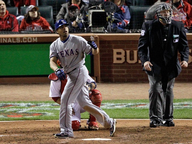 Nelson Cruz  watches the ball  
