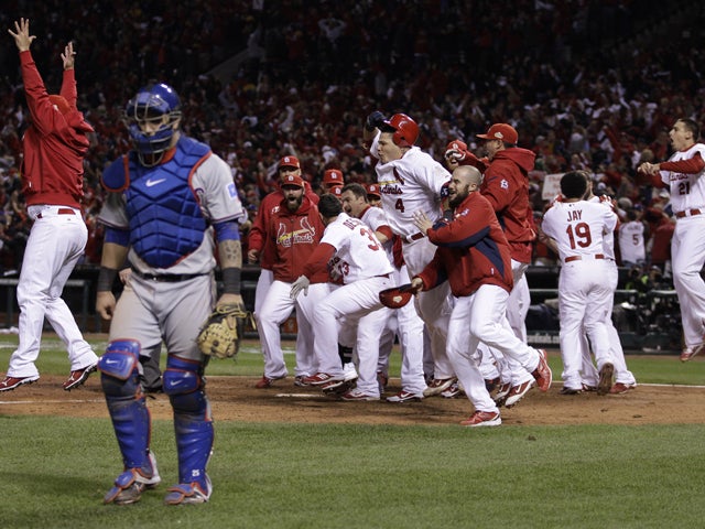 St. Louis Cardinals celebrate after David Freese hit a walk-off home 