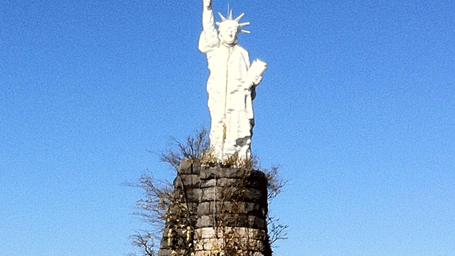 A replica of the Statue of Liberty is seen in the Susquehanna River.   