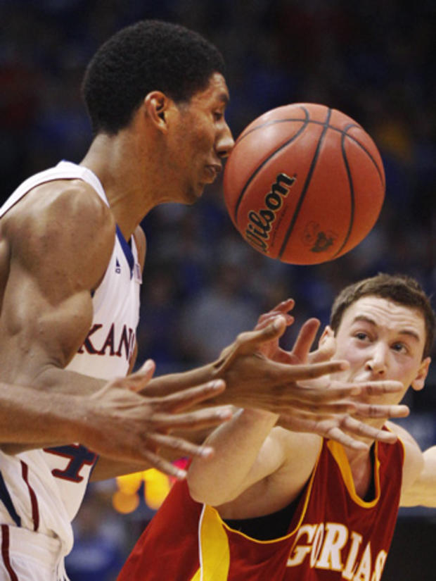 ball bounces off the nose of Kansas forward Justin Wesley  