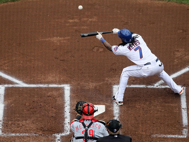 Jose Reyes lays down a first inning bunt single 