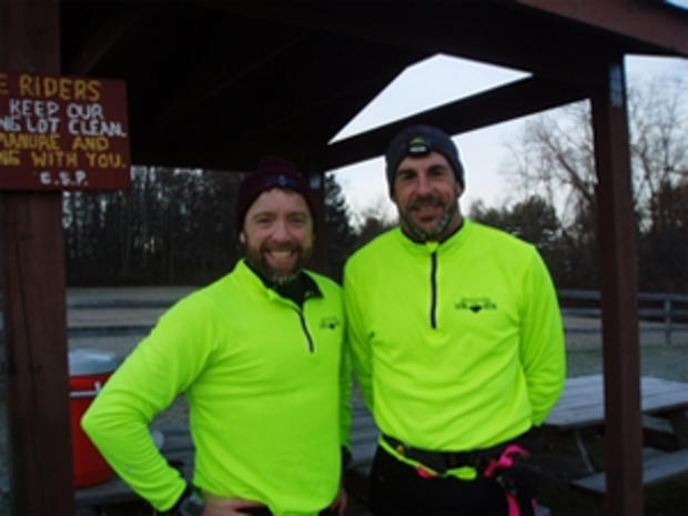 1/21/12 – Baltimore- Travel &amp; Outdoors – Top Baltimore Running Clubs – Two male runners in neon green 
