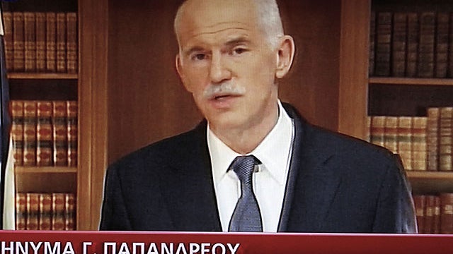 In this image taken from a TV screen Greek Prime Minister George Papandreou announces that an agreement has been reached on forming an interim government.  