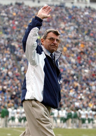 Joe Paterno waves to the crowd 