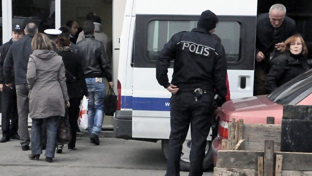 Passengers arrive at security office after being rescued from hijacked ferry 