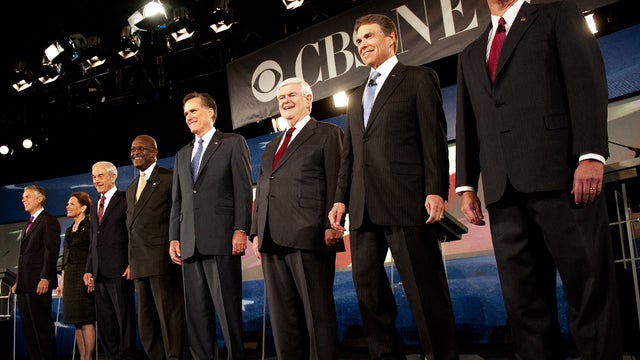 Republician presidential hopefuls, from left to right, Jon Huntsman, Michele Bachmann, Ron Paul, Herman Cain, Mitt Romney, Newt Gingrich, Rick Perry and Rick Santorum participate in the CBS News/National Journal Debate at Wofford College Nov. 12, 2011, in 