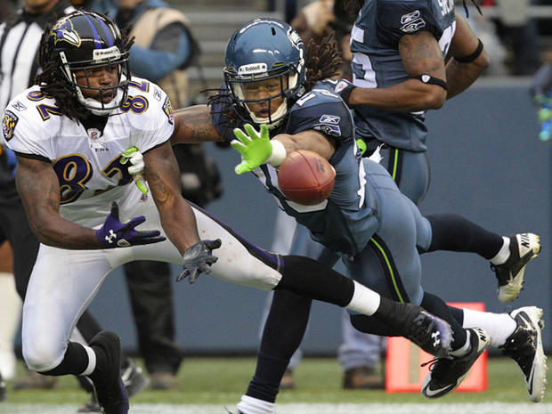 Earl Thomas blocks a pass intended for Torrey Smith 