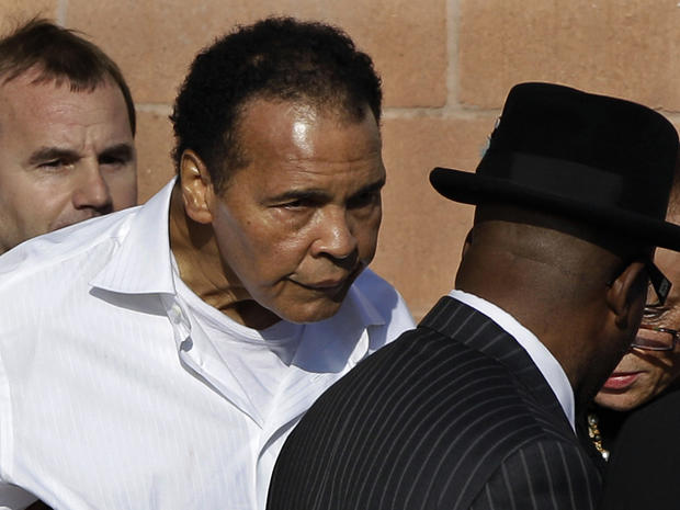 Muhammad Ali leaves after a memorial service 
