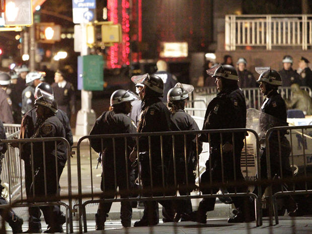 Police block streets and control the crowd as Occupy Wall Street protesters 