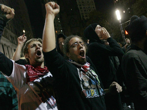 Occupy Wall Street demonstrators chant slogans 