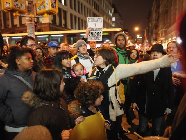 Protesters affiliated with the Occupy Wall Street movement march down Broadway to Foley Square Nov. 17, 2011, in New York City. 
