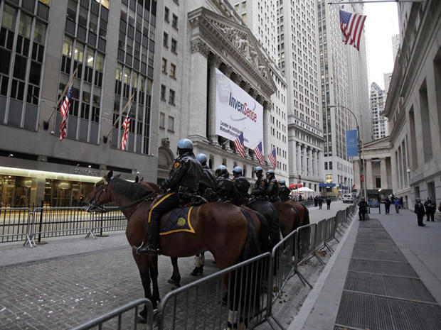 Mounted New York City police officers assemble on Broad Street in front of the New York Stock Exchange Nov. 17, 2011, to guard against part of a planned nationwide protest marking two months since the Occupy Wall Street movement began. 