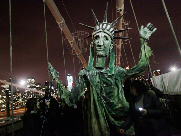 Protesters affiliated with the Occupy Wall Street movement march across the Brooklyn Bridge in New York City Nov. 17, 2011. The day has been marked by sporadic violence, arrests and injuries sustained by both protesters and police. Protesters marched arou 