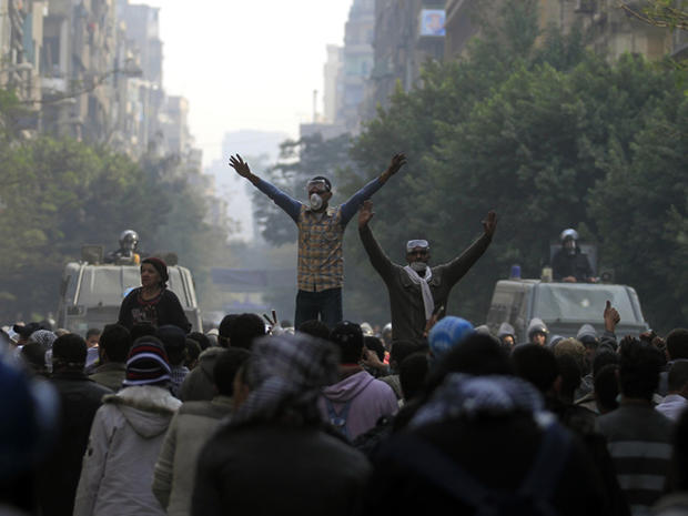 Protesters chant slogans during clashes 
