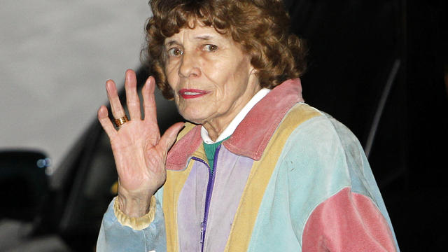 Sue Paterno waves to the crowd in front of the house where she lives with husband Joe Paterno after a Penn State football game Nov. 12, 2011, in State College, Pa. 