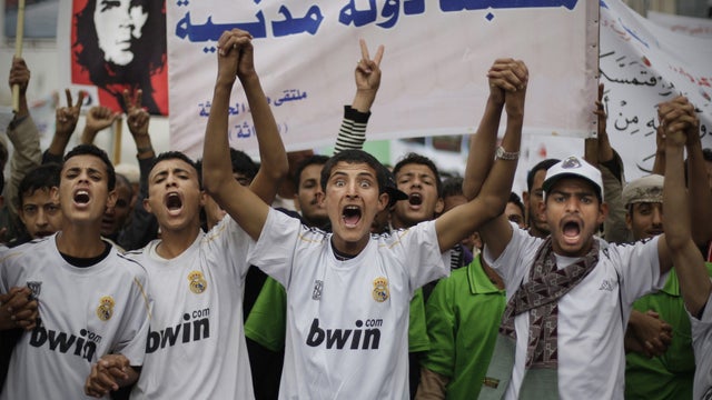 Protesters chant slogans during a demonstration in Sanaa, Yemen 
