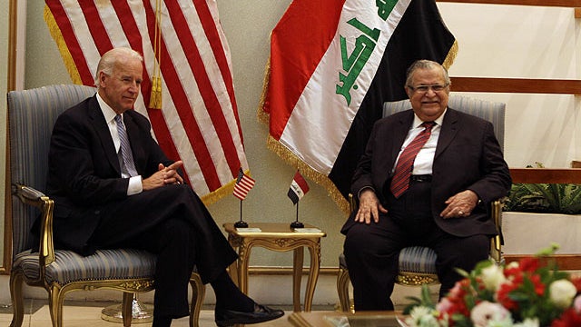 U.S. Vice President Joe Biden, left, and Iraqi President Jalal Talabani, right, attend a meeting in Baghdad, Iraq, Nov. 30, 2011.  