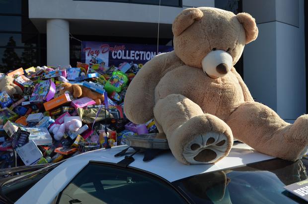 The 2011 John Force Holiday Car Show Netted Thousands Of Toys For CHIPS For KIDS 