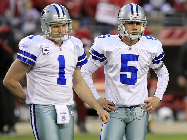 Mat McBriar (1) and kicker Dan Bailey stare back at the team bench after a timeout 