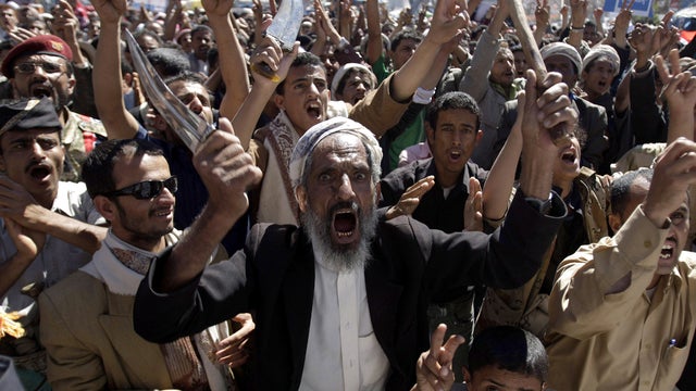 A Yemeni protester holds a dagger and chants slogans during a demonstration demanding the prosecution of President Ali Abdullah Saleh in Sanaa, Yemen, Dec. 6, 2011. The case is often made that Washington was caught flatfooted by the Arab Spring and now mu 