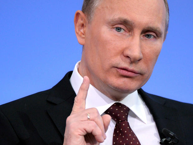Russian Prime Minister Vladimir Putin gestures during a national call-in television show in Moscow Dec. 15, 2011 