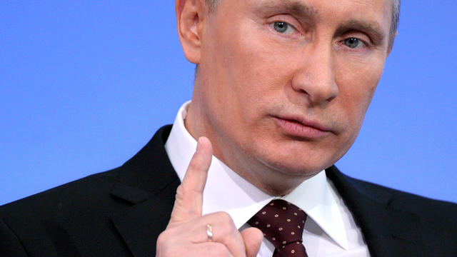 Russian Prime Minister Vladimir Putin gestures during a national call-in television show in Moscow Dec. 15, 2011. Putin said the results of Russia's recent parliamentary elections reflected the people's will and that the opposition had alleged vote fraud  