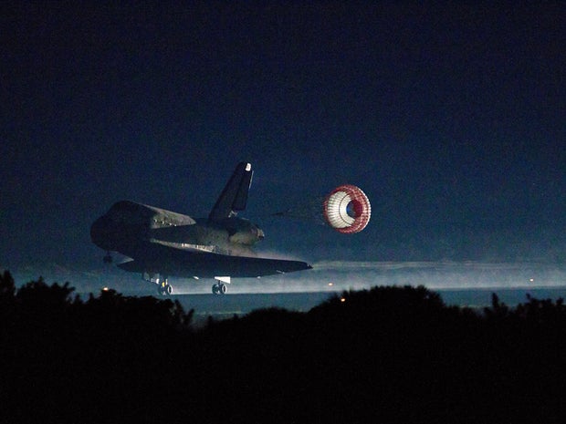 drag chute is deployed as the space shuttle Atlantis 