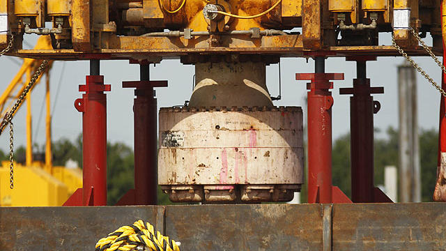 In a Sept. 13, 2010 file photo, the bottom of the blowout preventer stack, from the Deepwater Horizon explosion and oil spill, which is being examined as evidence for federal investigations, is seen at the NASA Michaud Assembly facility in New Orleans.  