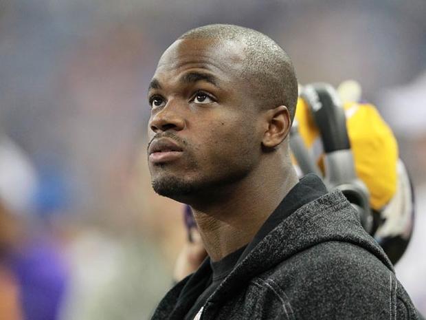 DETROIT, MI - DECEMBER 11: Adrian Peterson #28 of the Minnesota Vikings watches the action during the first half of the game against the Detroit Lions at Ford Field on December 11, 2011 in Detroit, Michigan. (Photo by Leon Halip/Getty Images) 