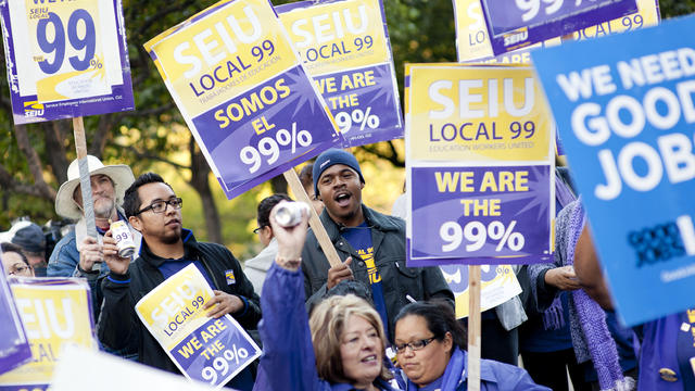 Members of SEIU Local 99 Education Workers Union support Occupy LA by protesting outside Bank of America Nov. 17, 2011, in Los Angeles. 