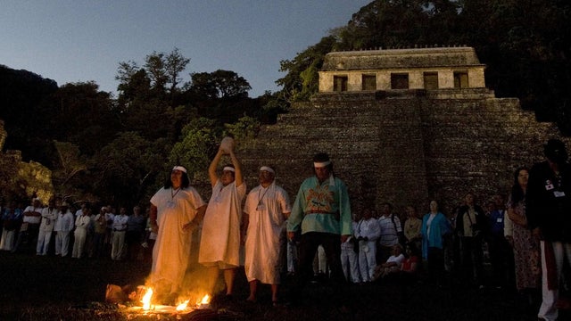 Mayan priests participate in a ceremony at the Mayan ruins of Palenque, Mexico 