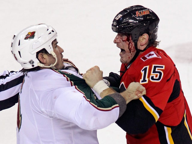 Tim Jackman fights Brad Staubitz 