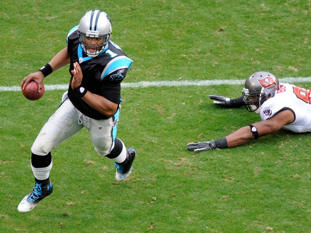 Cam Newton scrambles 