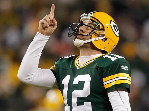 Aaron Rodgers celebrates a touchdown pass 
